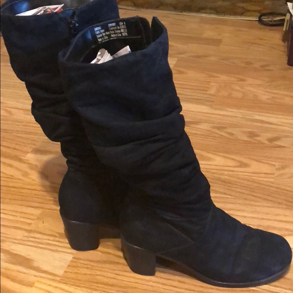 Black high top boots.
